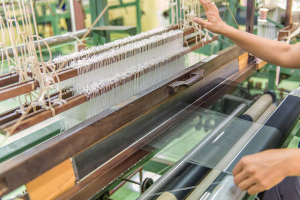 istock Weaving loom and shuttle on the warp 825060870