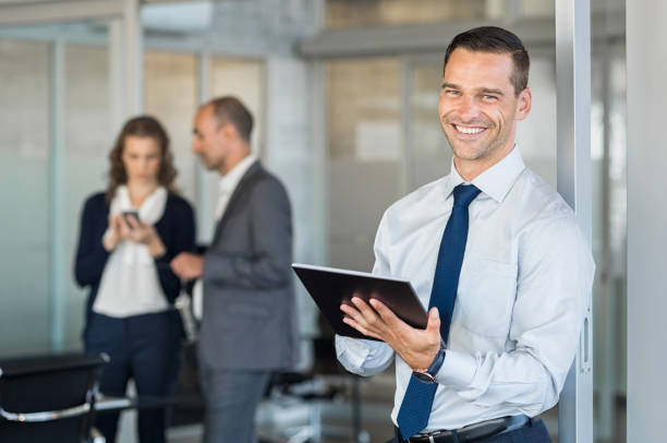 istock Successful businessman at office 825082878