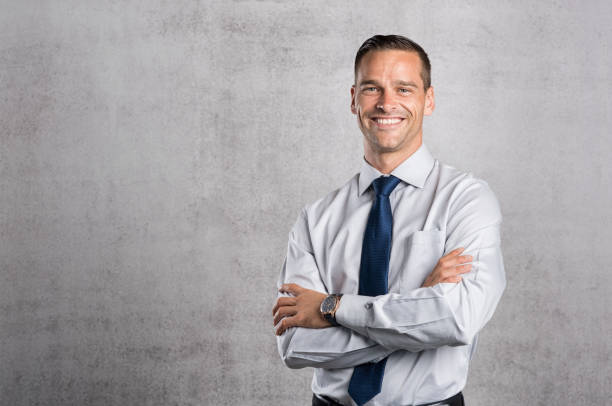istock Proud businessman smiling 825082942