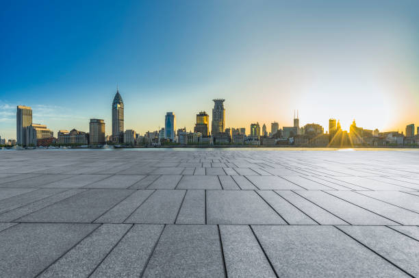 istock Cityscape and skyline of shanghai from empty brick floor 825092392