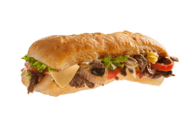 sub hoagie sandwich mit fleisch und gemüse - sandwich bacon lettuce and tomato delicatessen bacon stock-fotos und bilder