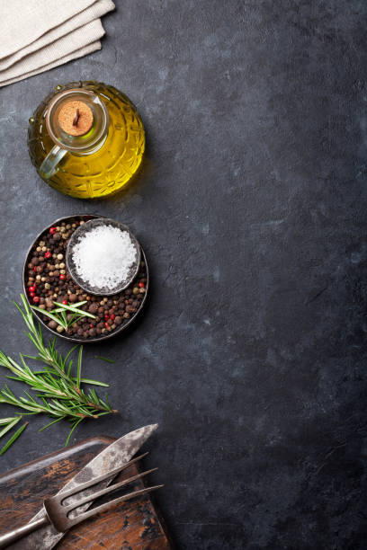istock Cooking ingredients and utensils on stone table 825095490