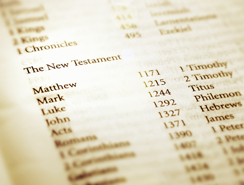 Cropped shot of the title page of a copy of the Holy Bible, showing the books of the New Testament.