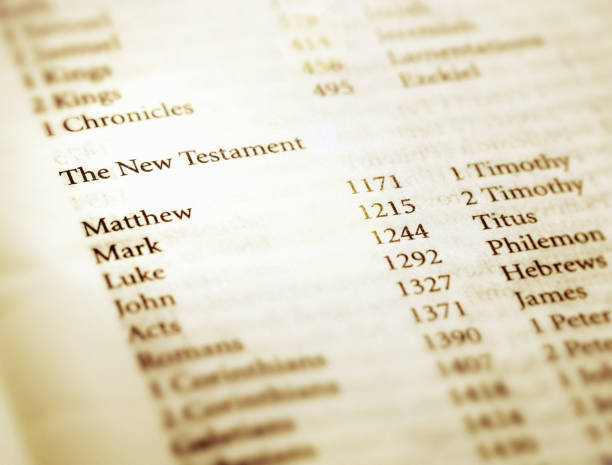 Title page of the Bible showing books of New Testament Cropped shot of the title page of a copy of the Holy Bible, showing the books of the New Testament. new testament stock pictures, royalty-free photos & images