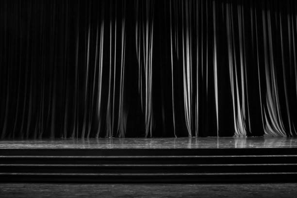 istock Black and white curtains and wooden stage. 825104644