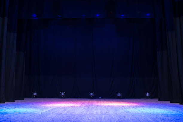 istock An empty stage of the theater, lit by spotlights 825109704
