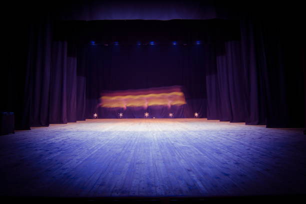 istock An empty stage of the theater, lit by spotlights 825112218