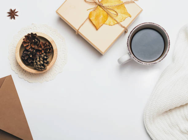 istock Coffee, sweater, pine cones and giftbox decorated with yellow leave 825113026