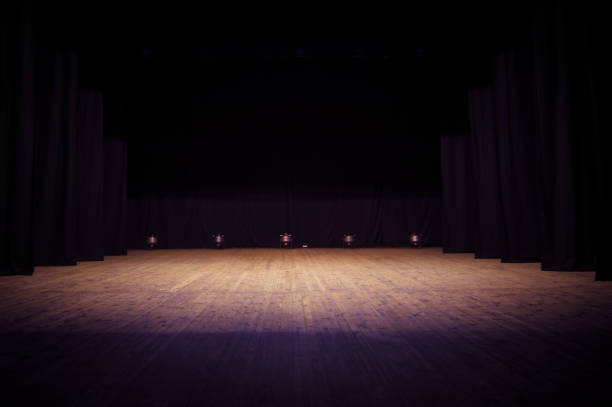 istock An empty stage of the theater, lit by spotlights 825113550