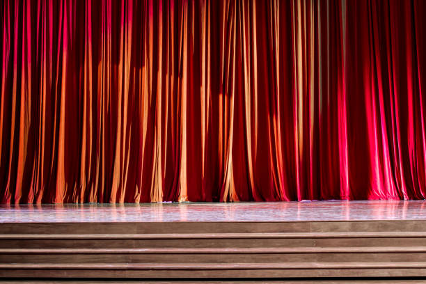 istock Curtains and wooden stage. 825118012