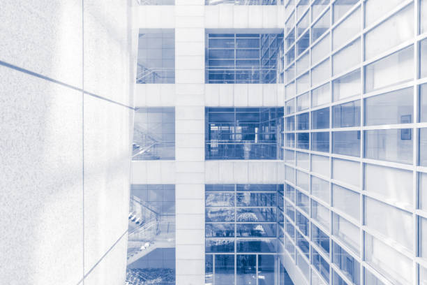 istock Modern glass wall in office building 825118110