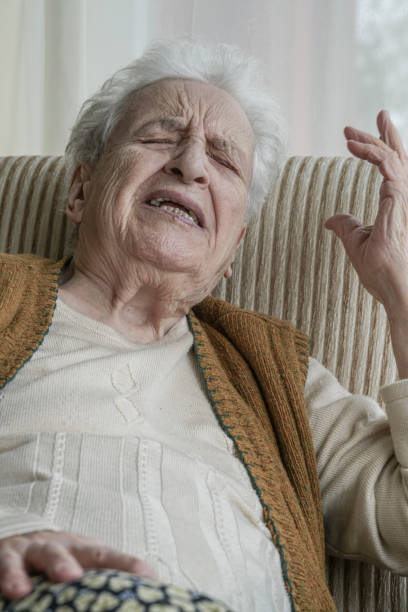 istock sad senior woman complaining something 825124702