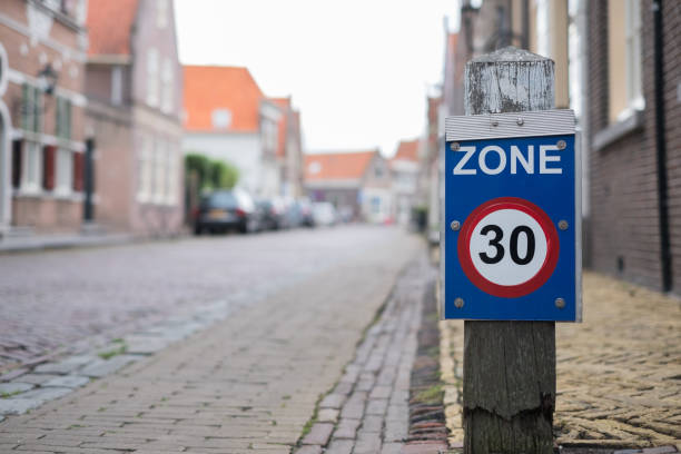 Sign zone of maximum speed 30 on old town street