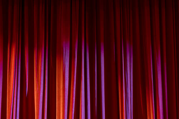 istock Red curtain in the theatre. 825124798