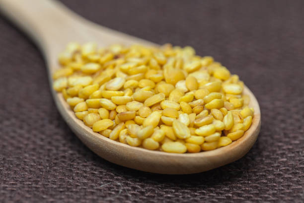 istock peeled mung beans on wood spoon 825129562