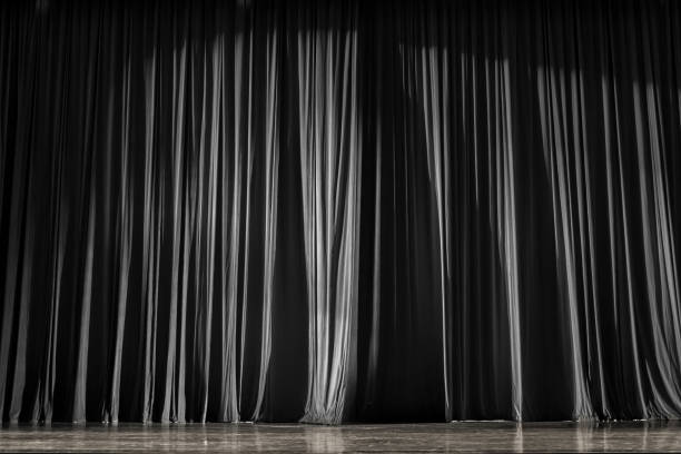 istock Black and white curtains and stage. 825130374