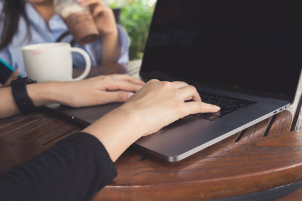 istock Woman hand working with partner at cafe 825138694
