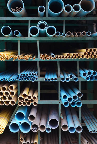 istock Many PVC Pipes stacked in warehouse 825138986