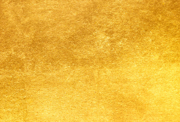 istock Shiny yellow leaf gold foil texture 825141650