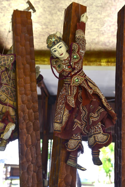 istock traditional wooden puppets 825142214