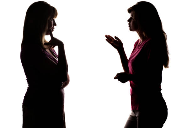 istock Silhouette mother and daughter dialogue 825145404