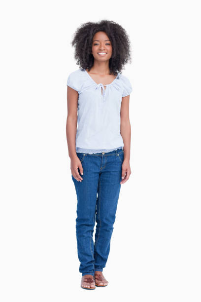 istock Young woman standing upright while showing a great smile 825148198