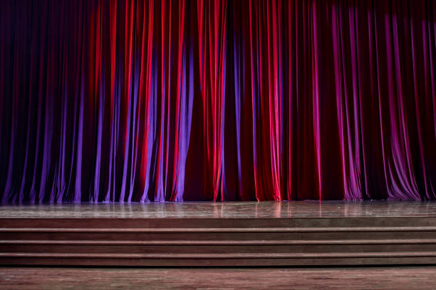 istock Red curtains and wooden stage. 825148456