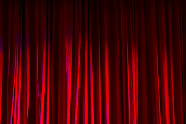 istock Red curtain in the theatre. 825151028