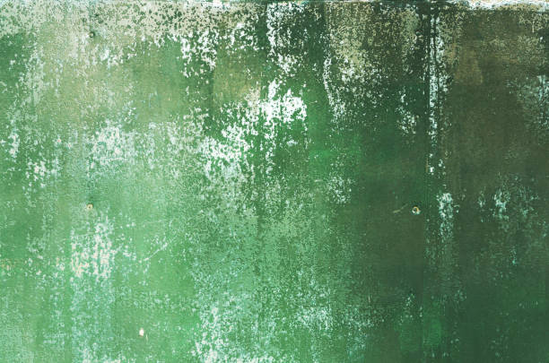 istock Rusty metal background of emerald color 825151712