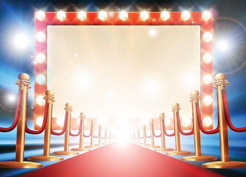 Red carpet background with theatre or cinema style light bulb sign
