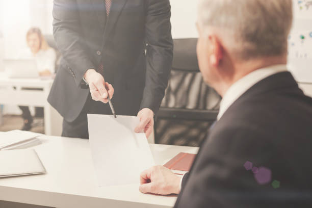 istock Qualified attentive worker asking for bosses signature 825172336