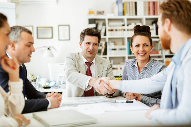 istock Businesspeople shakind hands 825173046