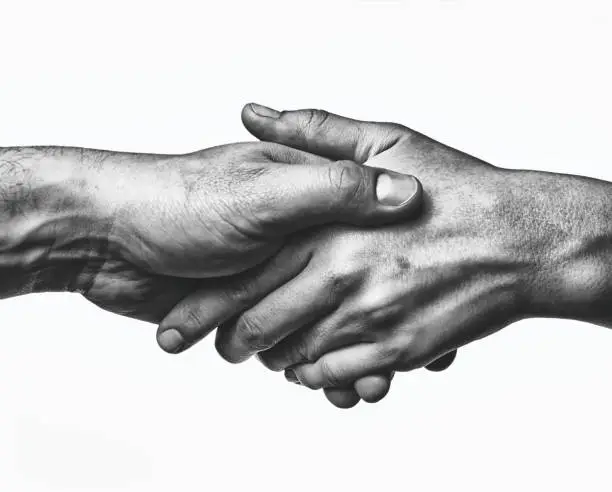 Photo of A firm handshake