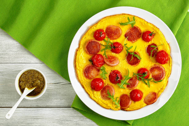 istock omelette with sausages and cherry tomatoes 825200220