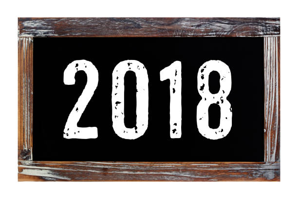 istock 2018 new year on vintage chalk board isolated on white background 825202190