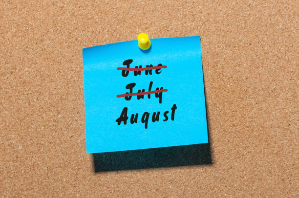istock August beginning and last summer month end concept written at sticker. Striked June, July 825204180
