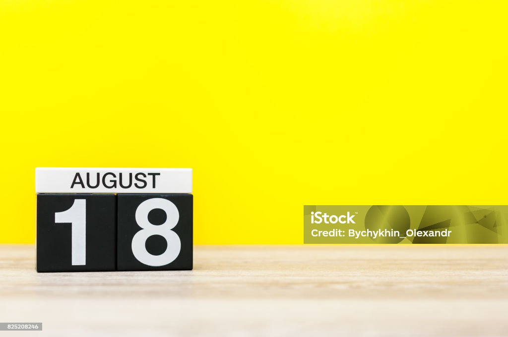 August 18th. Image of august 18, calendar on yellow background with empty space for text. Summer time August 18th. Image of august 18, calendar on yellow background with empty space for text. Summer time. August Stock Photo