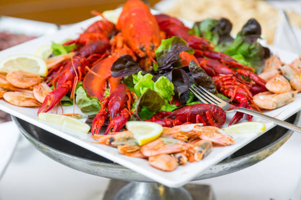istock Cooked cancer at a banquet table for a wedding. Snack for beer 825210844