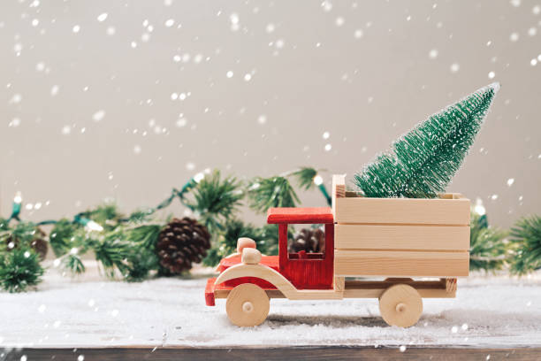 istock Christmas tree on toy truck 825216472