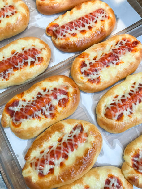 istock Sausage bread in the bakery shop 825217062