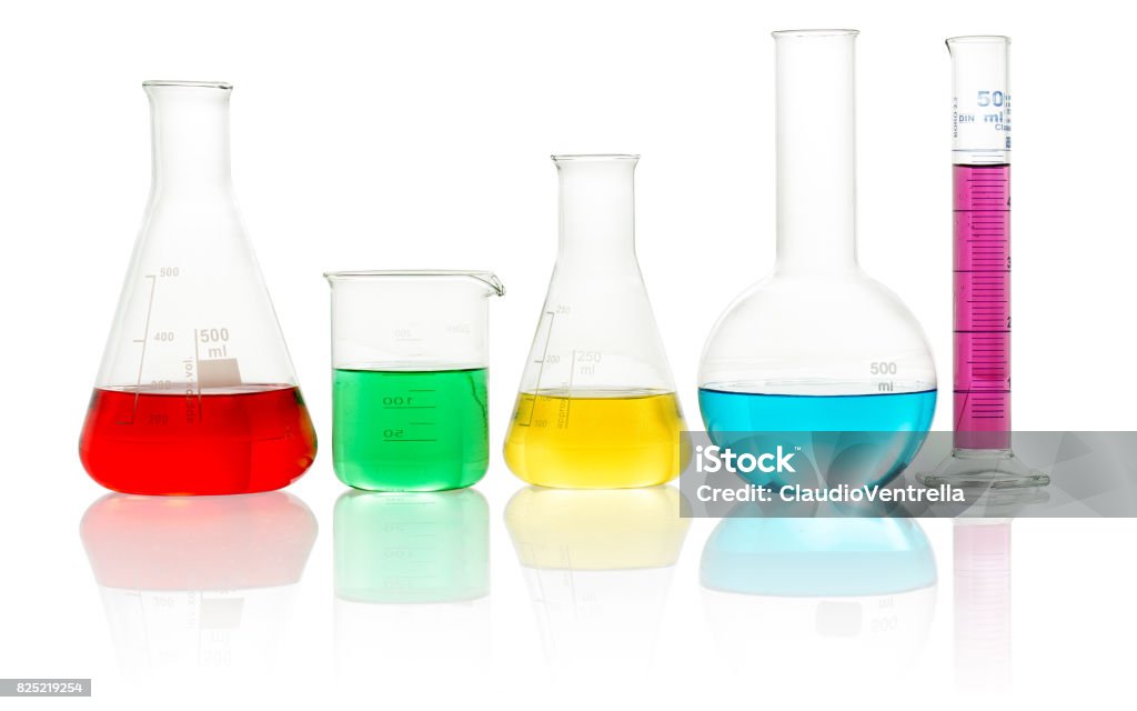 lab glassware filled with colorful liquid laboratory glassware filled with colorful liquid on white background Beaker Stock Photo