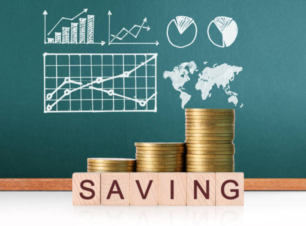istock Coins graph stock market 825219424