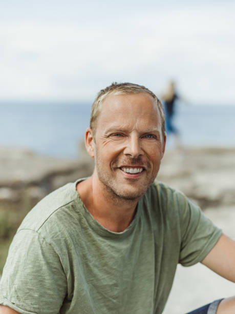 istock Man and cool rock formations raukar outdoors in nature 825220232