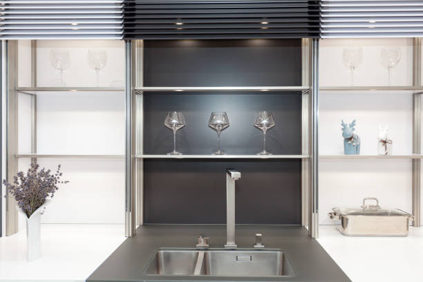 istock New modern black and white kitchen with chrome water tap and rectangular designer kitchen sink 825226510