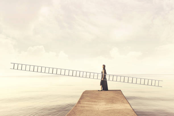istock Woman carries a long imaginary scale to climb into the sky 825228428
