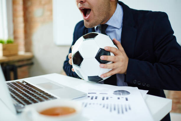 Businessman with soccer ball