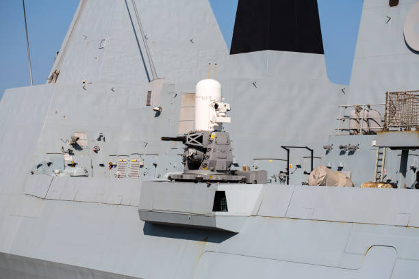 istock Anti-aircraft defense systems of a destroyer type 45 Daring. Shipborne weapons systems. Deck of a military ship close-up. 825231104