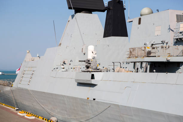 istock Anti-aircraft defense systems of a destroyer type 45 Daring. Shipborne weapons systems. Deck of a military ship close-up. 825231202