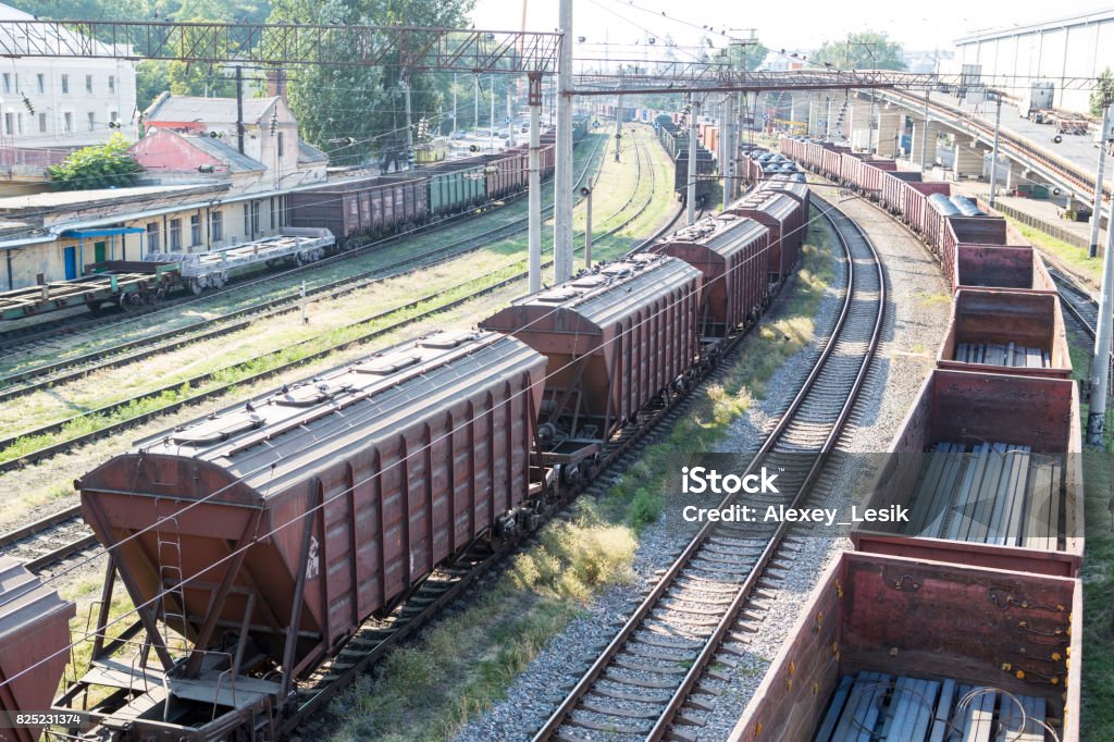 Railway Wagons With Cargo Of Metal And Grain In The Port Railway Wagons Railway Wagons With Cargo Of Metal And Grain In The Port Railway Wagons