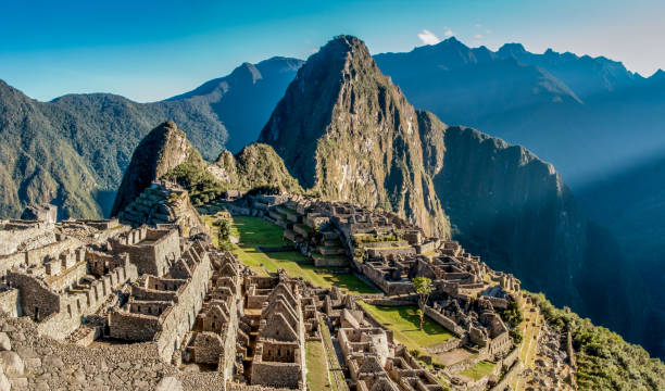 istock Machu Picchu panoramic view at sunrise 825235532